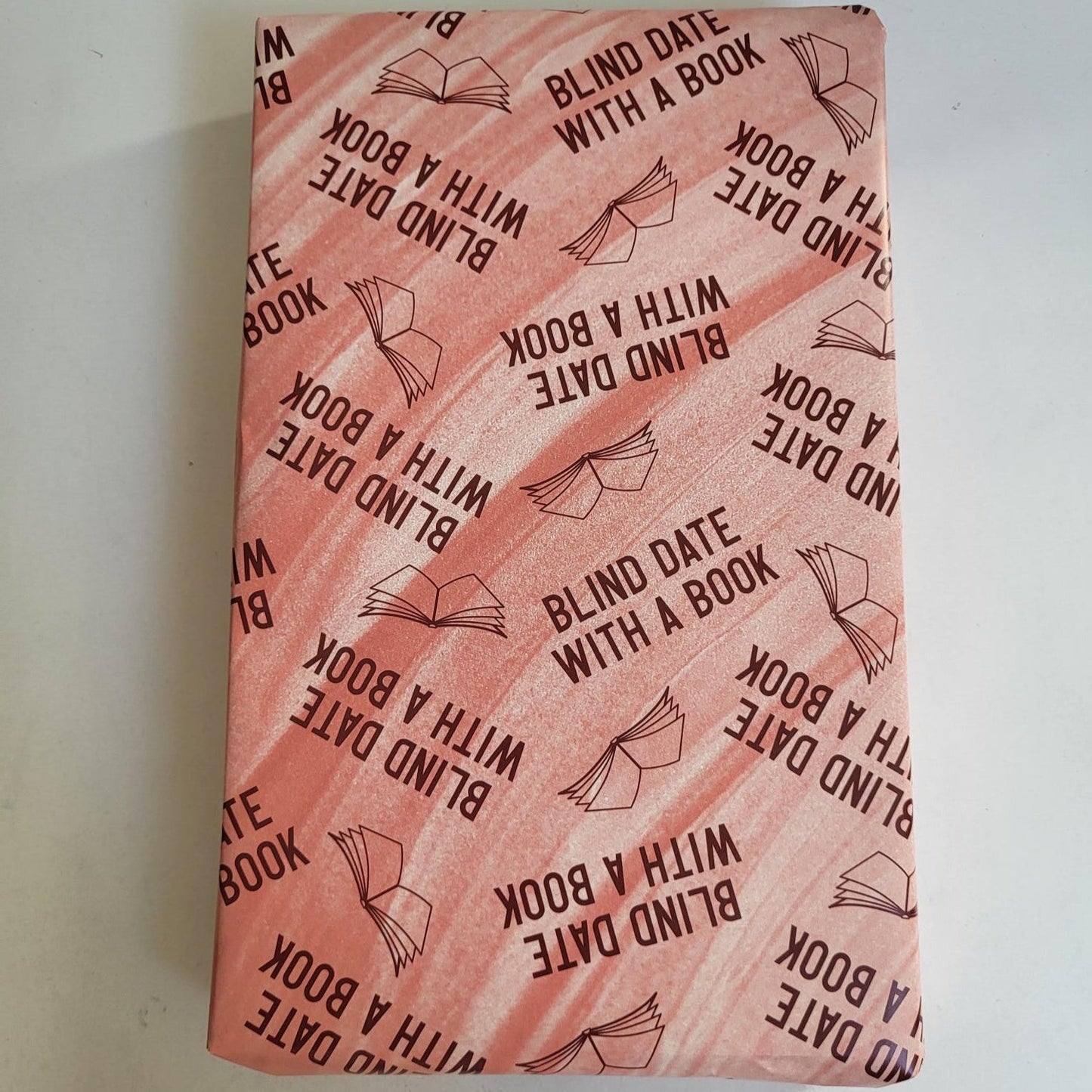 book wrapped in blind date with a book wrapping paper
