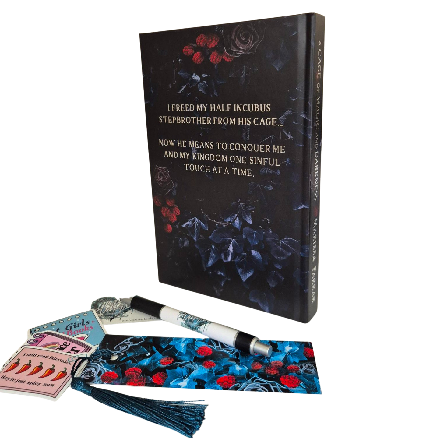 Decorative book with floral design and text, accompanied by bookmarks and cards on a white background