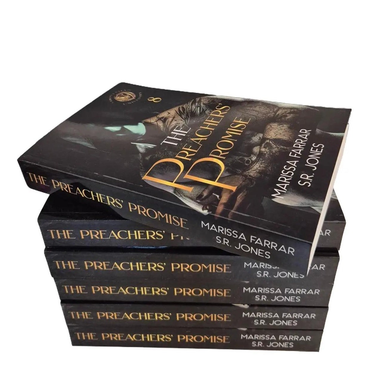 Stack of books titled 'The Preachers' Promise' by Marissa Farrar and S.R. Jones on a white background