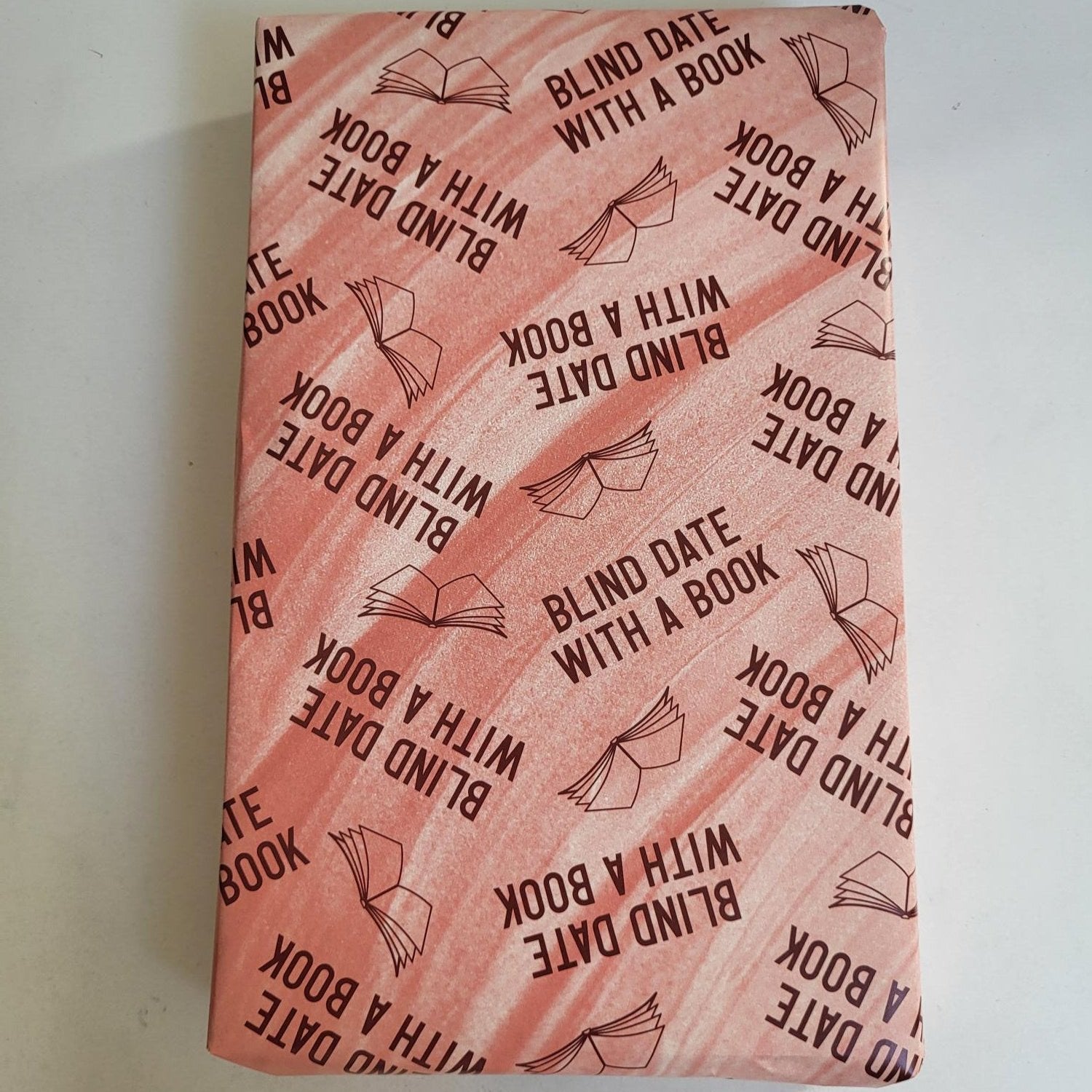 book wrapped in blind date with a book wrapping paper 