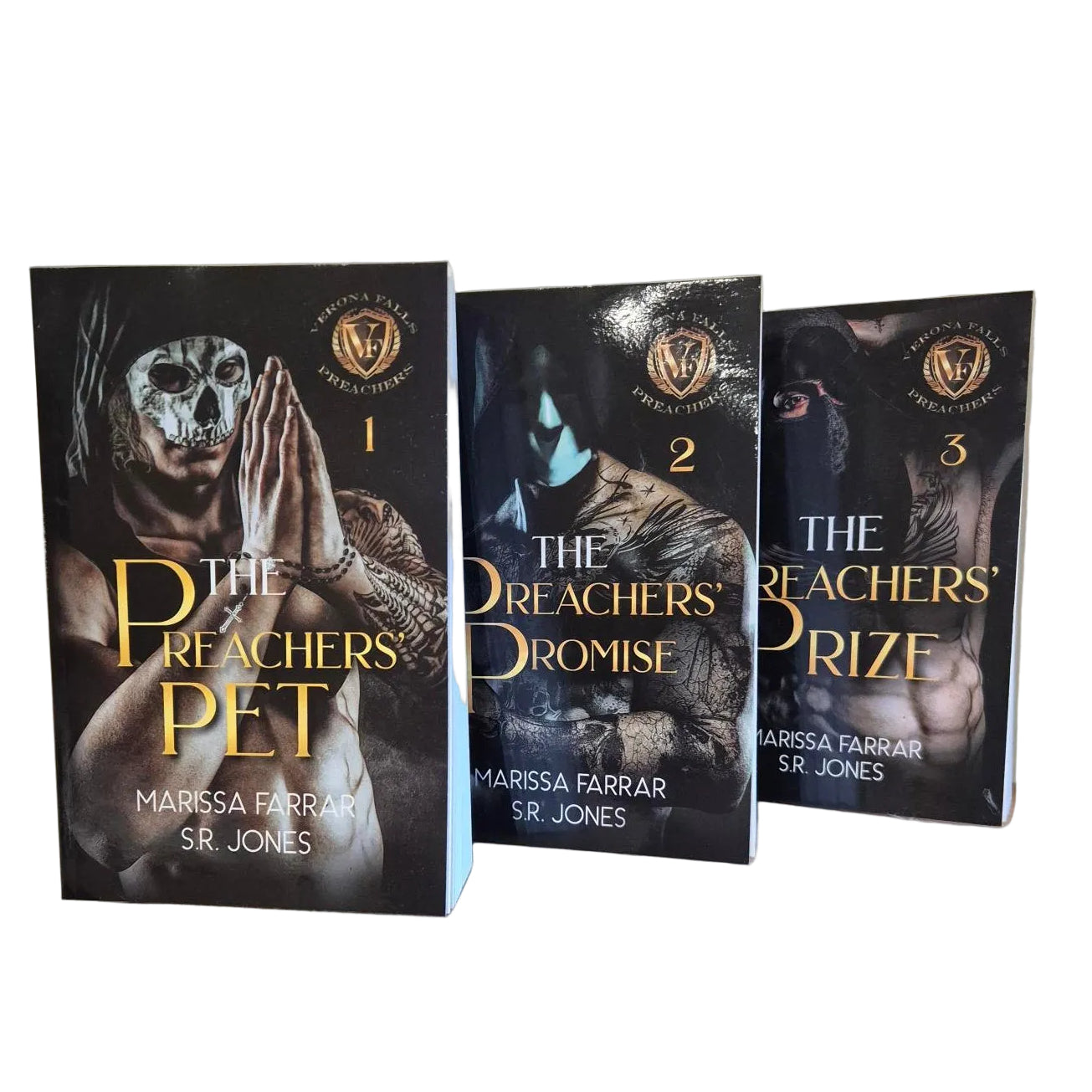 Three books titled 'The Preacher's Promise', 'The Preacher's Ordeal', and 'The Preacher's Pet' on a wooden surface.